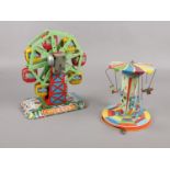 Two 1950's tin plate toys fairground carousel ride & tin plate/plastic Child land big wheel