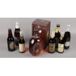 A collection of sealed alcohol to include boxed 15 year old Dimple whiskey, Hardy's ale,