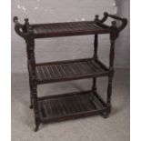 A man of war teak, three tier slatted trolley on casters. By B.Maggs & Co Clifton, Bristol.