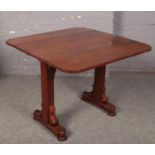 A mahogany rise and fall drop leaf buffet table with carved support. (Top 92cm wide) Slight crack to