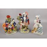 Three Staffordshire ceramic figurines, to include a Large Figurative Staffordshire Flatback Spill