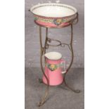 A 19th century brass wash stand with Minton jug and bowl. Jug and bowl in good condition.