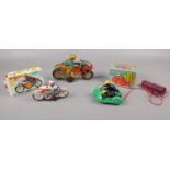 A group of vintage tin plate toy motor cycles, Motosprint, Clifford series examples, Racing