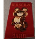 A bedside/fireside rug commemorating the Moscow 1980 Olympic games (70 x 130cm)