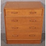 A light oak chest of 4 drawers. (84cm x 76cm) Scratches to top & drawers.