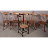 Five pine spindle back chairs along with a rush seat barley twist chair. Chairs in good condition.