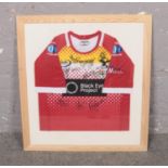 A framed & Autographed Sheffield Eagles Rugby League Shirt