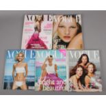 Five Vogue fashion magazines, mainly 1998.