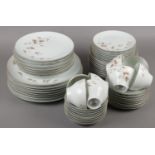 A collection of Noritake dinner/teawares in the Woodland design to include dinnerplates, side