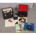 A carry case of LPs and singles to include Paul McCartney, Barry White, Diana Ross, George Benson,