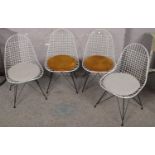 Four metal retro style chairs.