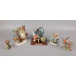 A selection of ceramic figurines to include, Kingfishers by Leonardo and a Ray Falk deposed figurine