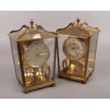 Two brass Schatz 400 day torsion clocks. One missing pendulum.