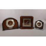Three wooden mantel clocks comprising of two Bentima clocks one of which was presented to John