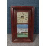 A 19th century American Jerome & Co. New Haven Clock Co wooden cased wall clock with glass tablet