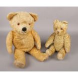 Two vintage jointed mohair bears, both with glass inset eyes.
