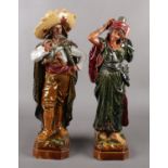 A pair of large pottery figures of a Mexican couple, possibly German, incised mark to base. (