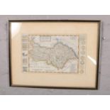 A framed and mounted coloured engraving map of 'The North Riding of Yorkshire' by Herman Moll -