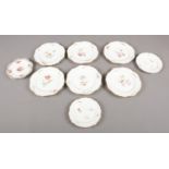 Six Wedgwood floral ceramic cabinet plates (14.5cm diameter) with similar examples