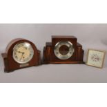 Three clocks comprising of a stepped Oak cased Art Deco mantel clock by the Norland Clock Company
