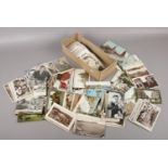 A box of vintage postcards to include colour and monochrome examples etc.