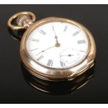 A gold plated pocket watch. running loses time