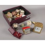 A box of collectables to include trinket boxes, bottle openers, clock, cuff links, etc.