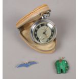 A Ingersoll pocket watch. To include a RAF silver sweetheart brooch & a malachite pendant carved
