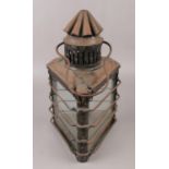 A 19th century oil lantern of triangular form, by John Evitt London.