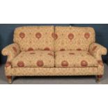 An upholstered 3 seat sofa along with two matching armchairs. Some wear and tear to the upholstery.