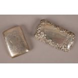 Two silver vesta cases. One assayed Birmingham and the other stamped sterling.