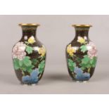 A pair of cloisonne vases, decorated with flowers. 14cm H.