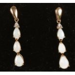 A pair of 9ct gold and pearl droplet ear studs.