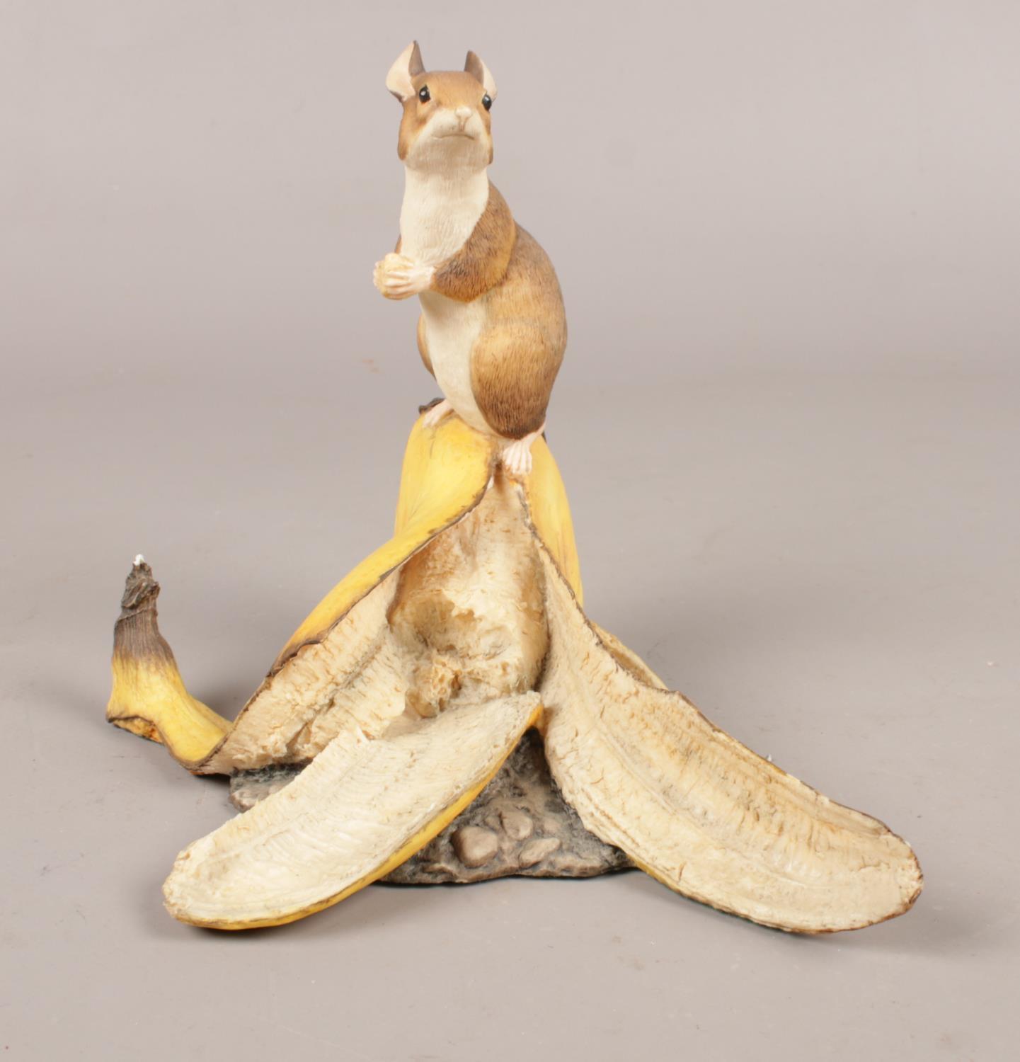 A Border Fine Arts figure of a mouse with a banana. H 13cm.