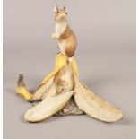 A Border Fine Arts figure of a mouse with a banana. H 13cm.