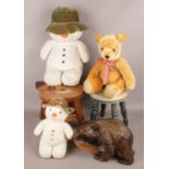 A box of miscellaneous. Including two stools, two Raymond Briggs Snowmen, plush teddy, carved