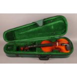 A 'Antoni' Debut 3/4 Violin, comes in green velvet lined case, label to interior. Total length: