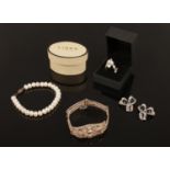 A collection of jewellery. Filigree silver bracelet, pearl & silver bracelet, Links of London