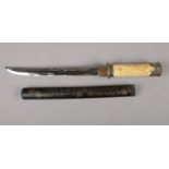 A reproduction Japanese Wakizashi short sword. (28cm blade). Dragon decoration to the handle and