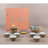 A Chinese Heng Fu Tea/sake set.(boxed) Brand new in box, unused