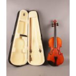 A Karl Höfner Bubenreuth 1986 Violin - No 701 15.5, together with a bow. Included is a separate