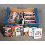 A box of Dvd's various genre's