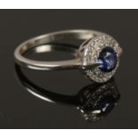 A white metal blue gem stone & diamond ring, size O, 2.27g.