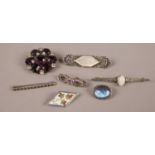 Seven silver brooches. Including paste stone set examples etc.
