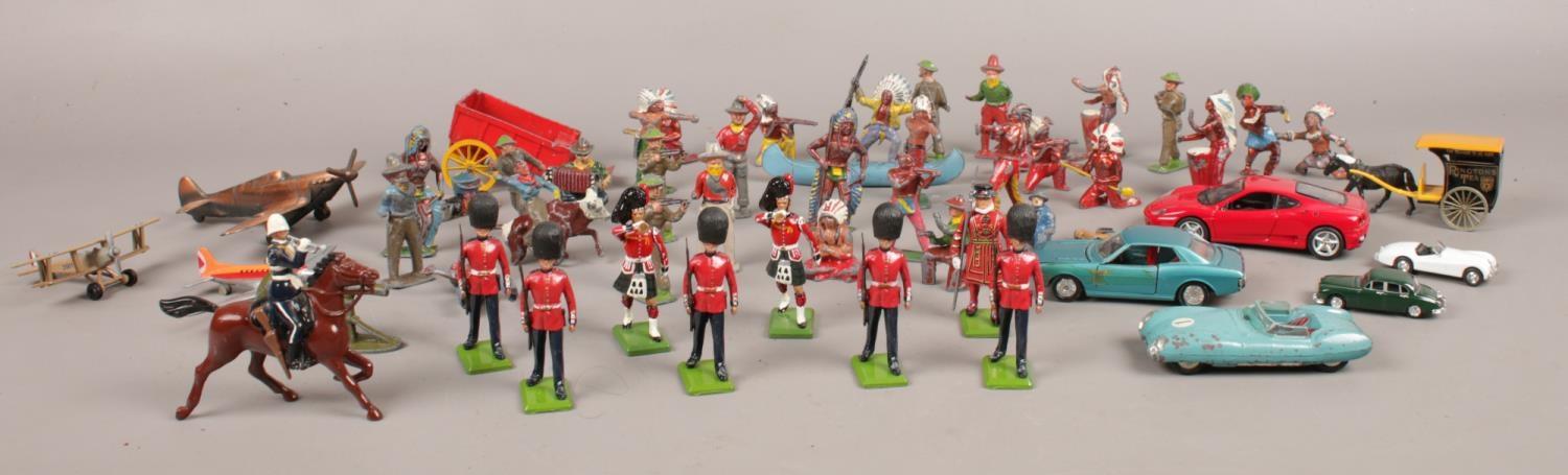 A collection of mainly vintage toy soldiers. To include Britains collectors figures, Corgi '