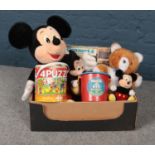 A box of assorted Toys, Mickey Mouse cuddly toys, Paddington Bear cuddly toy, Rock a bye bucket of