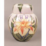 A Moorcroft ginger jar in the 'Windrush' pattern, boxed. H:11cm. Condition good, no chips or