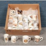 A group of commemorative mugs. Shelley, Aynsley, Crestware, Crown Ducal examples etc