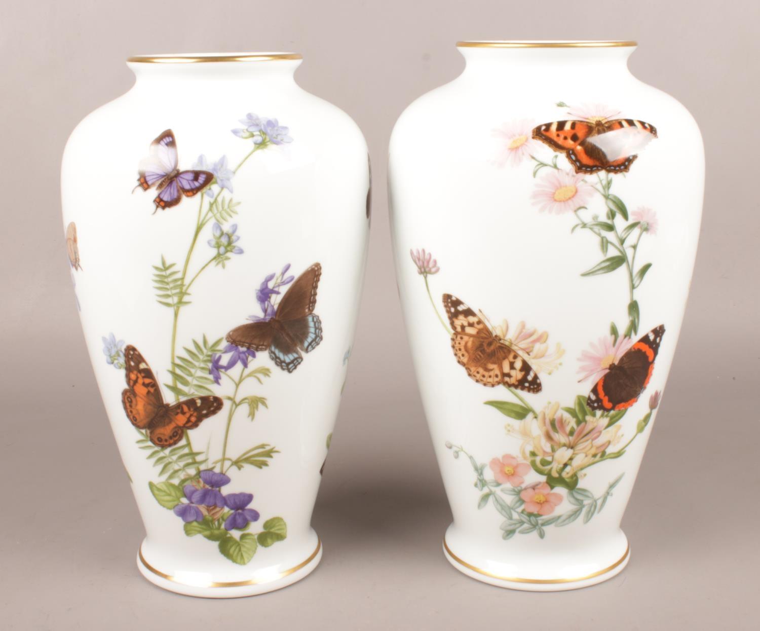 Two Franklin Porcelain limited edition vases by John Wilkinson. The Country Garden Butterfly Vase