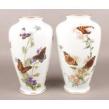 Two Franklin Porcelain limited edition vases by John Wilkinson. The Country Garden Butterfly Vase